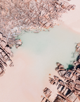 Aerial view of Injidup Beach, Yallingup with a rock-lined tidal pool bordered by granite formations and pale sand with shallow clear water