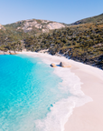 Aerial view of Little Beach, Albany with granite boulders on a curved beach and clear shallow water meeting pale sand