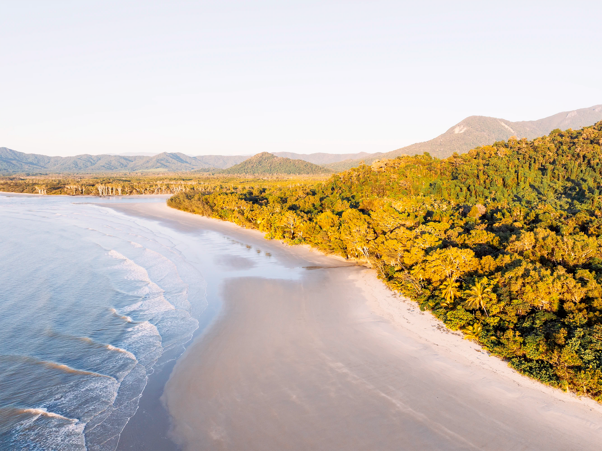 Warm coastal light over Thornton Beach and Cape Tribulation, Queensland – fine art photography print by fourbyfiver.