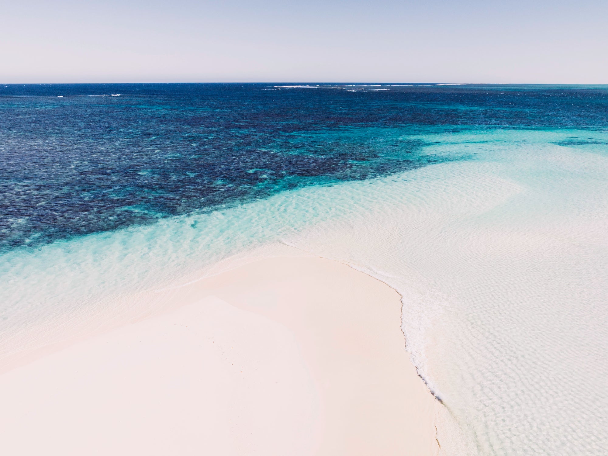 Fine art print of clear turquoise water over Ningaloo Reef at Turquoise Bay, Cape Range by fourbyfiver.