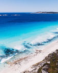 Aerial view of Twilight Beach, Esperance with Granite Islands and soft blue coastline captured as coastal wall art.
